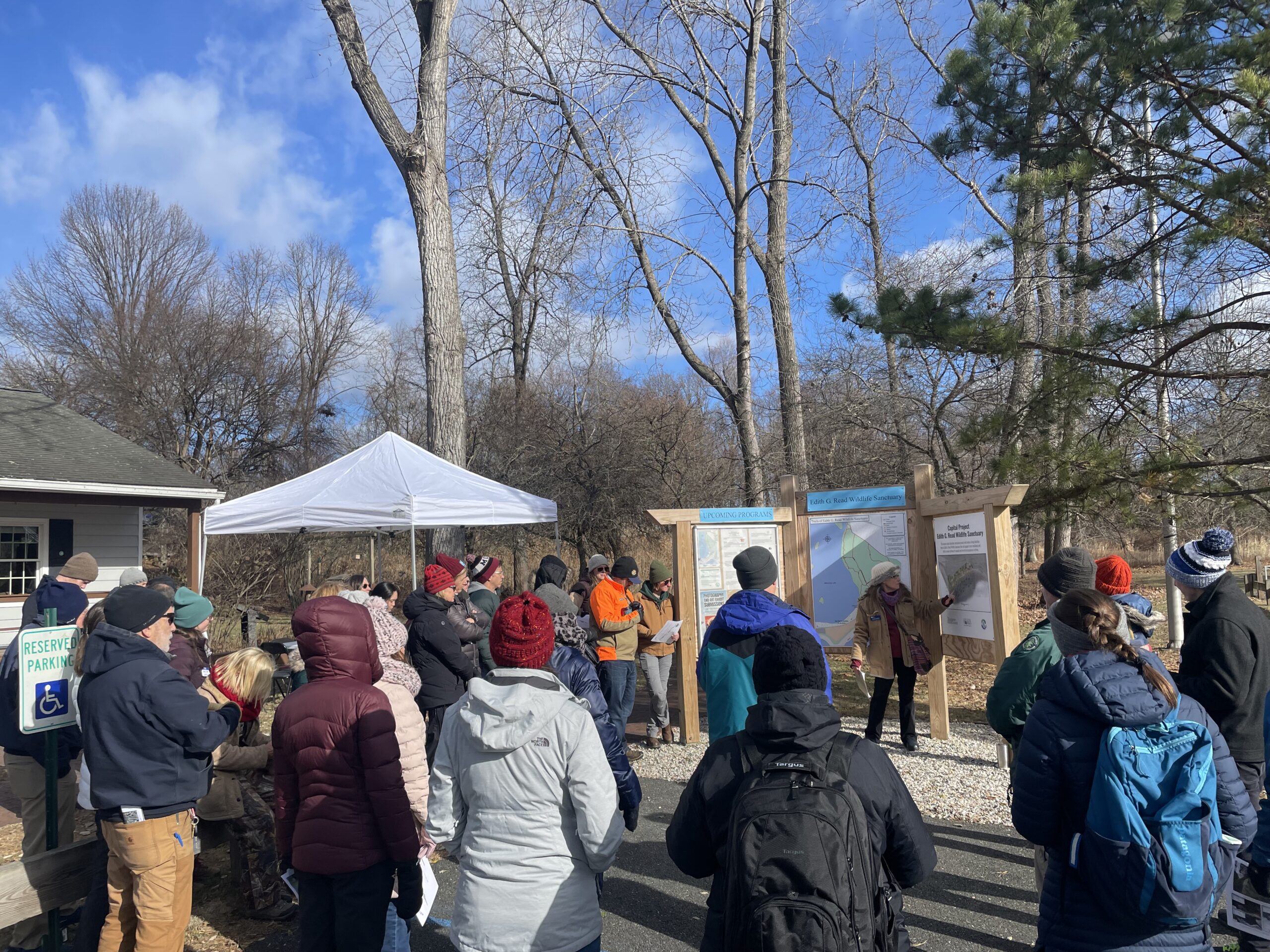 Picture of Suzette Lopane with the Westchester County Department of Planning talking to field trip participants about the history of the living shoreline site.